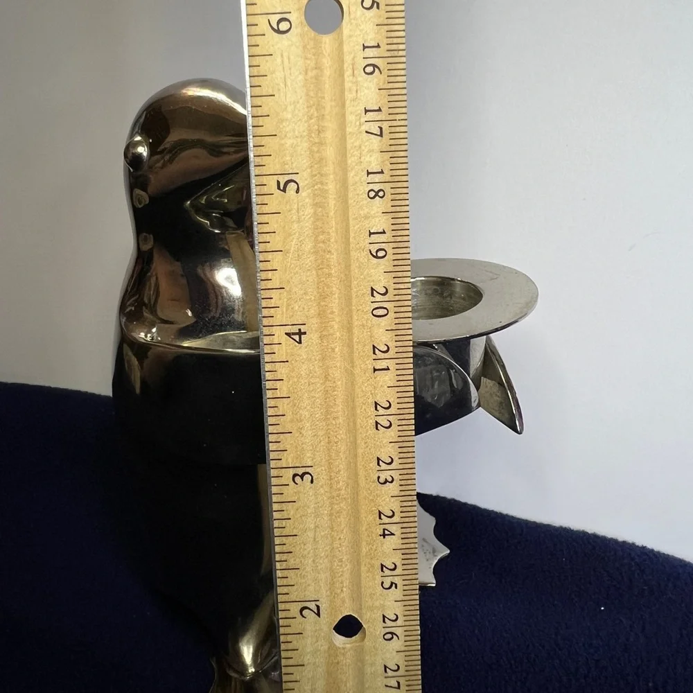 Vintage Restoration Hardware Penguin Candlestick With A Polished Silver Finish